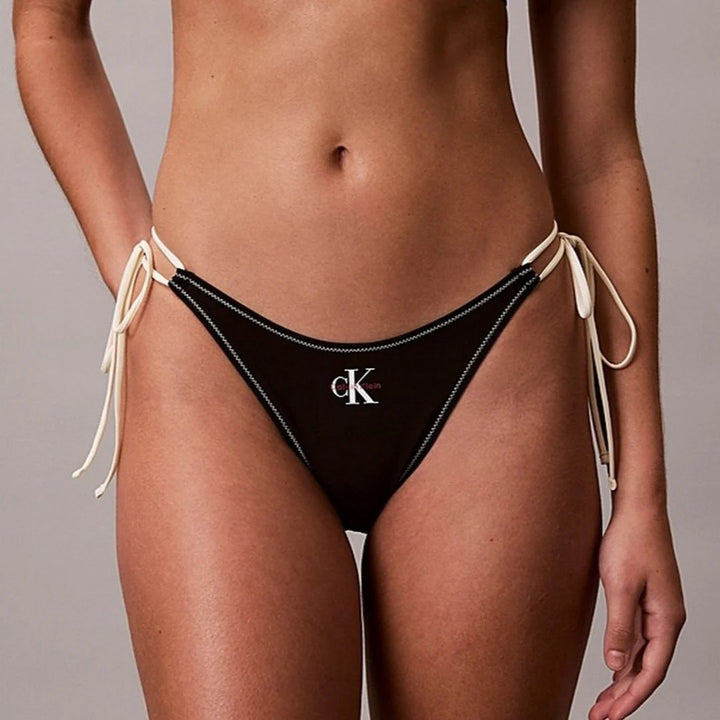 SLIP BIKINI CALVIN KLEIN CON LACCETTI LATERALI